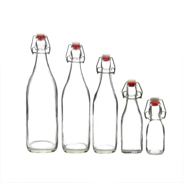 Various sizes clear glass beverage bottles for juice beer kombucha with swing tops